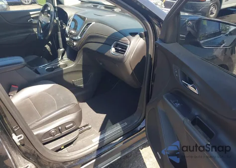 2018 Chevrolet Equinox Premier z USA, uszkodzony, nr VIN 2GNAXVEV7J6318103